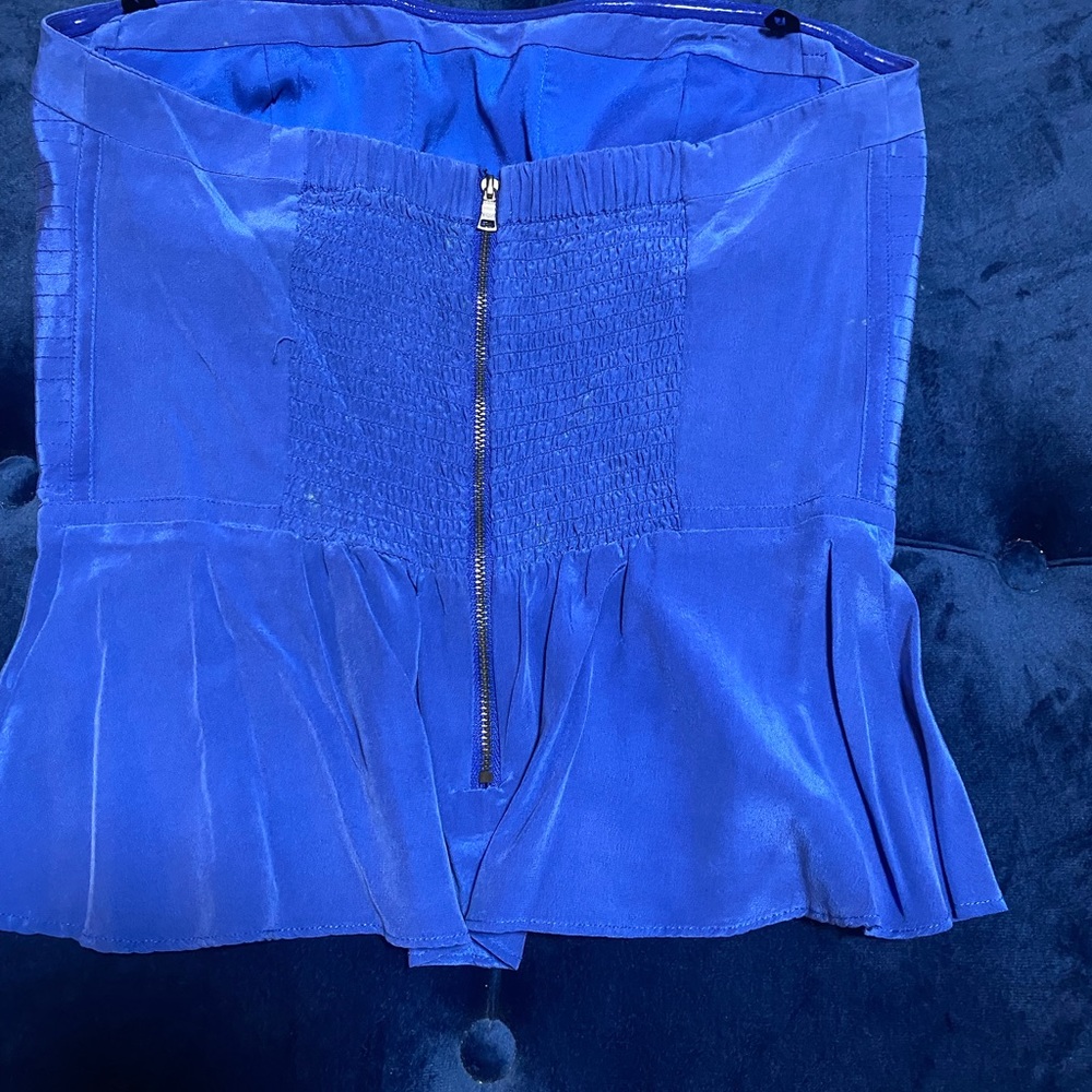 Beautiful Bebe blue silk top